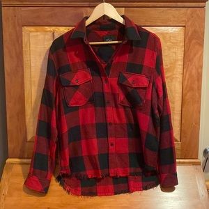 Rails red and black small flannel, frills on the bottom.